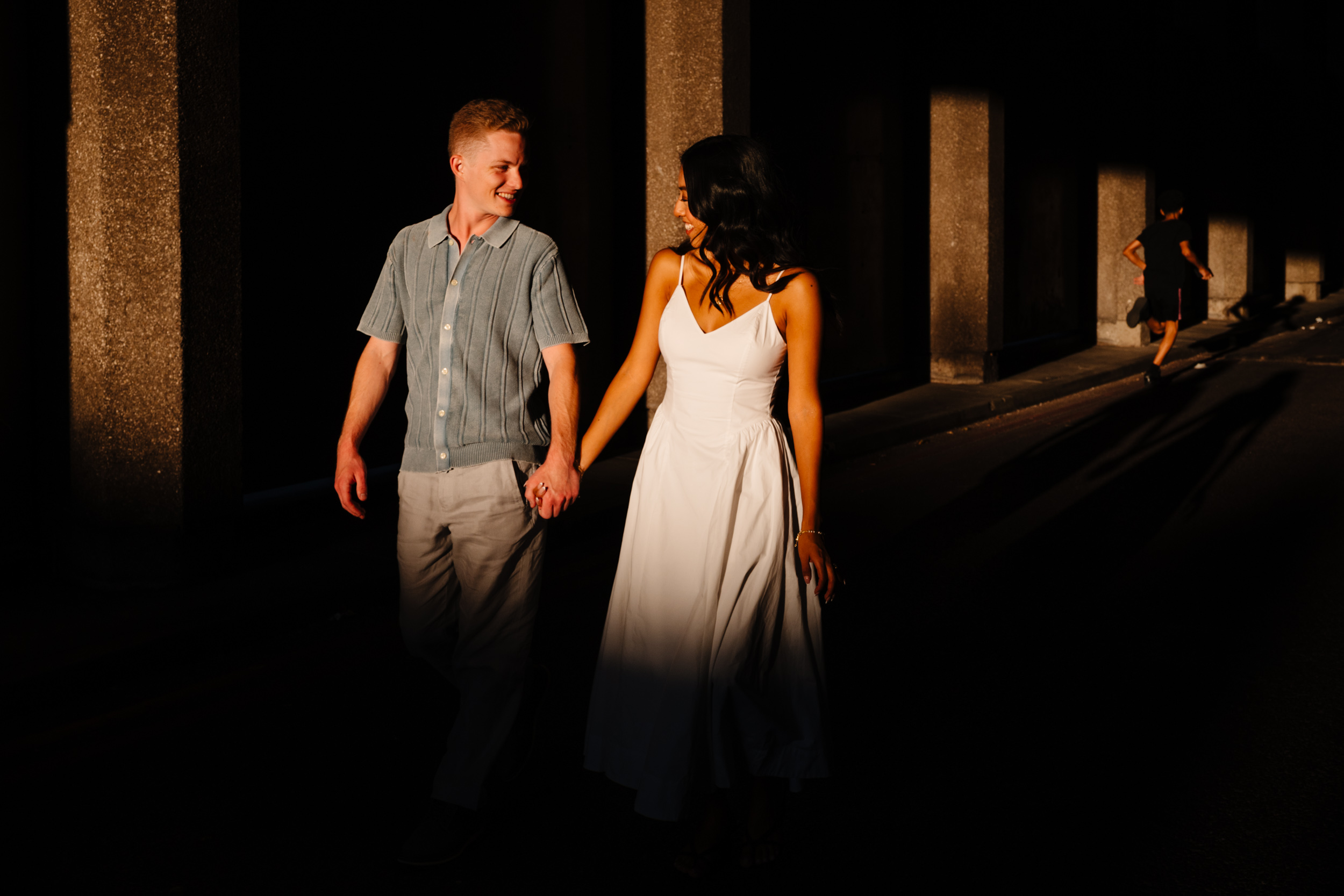 couple walking towards the sunset