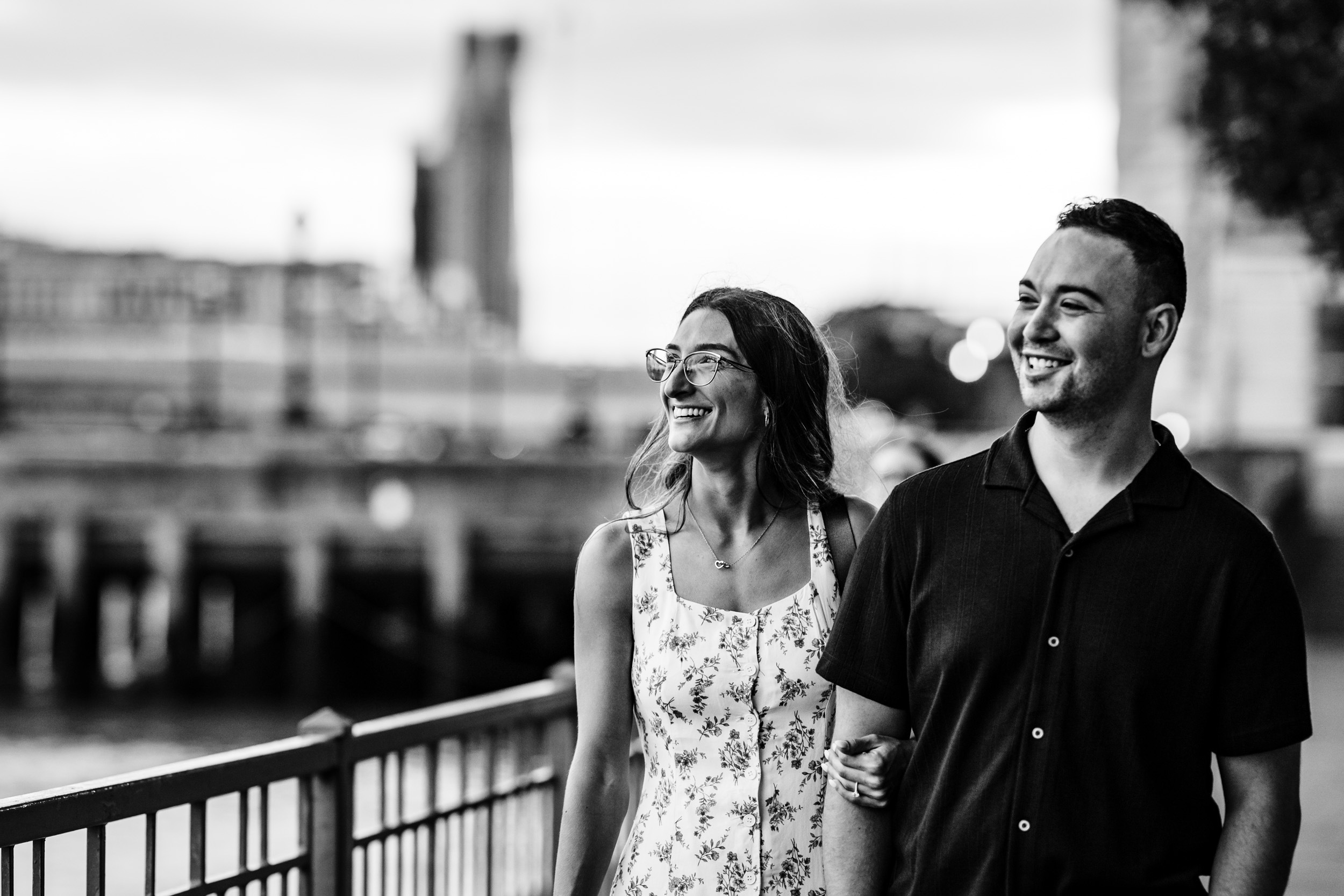 couple walking holding hands near Tower Bridge