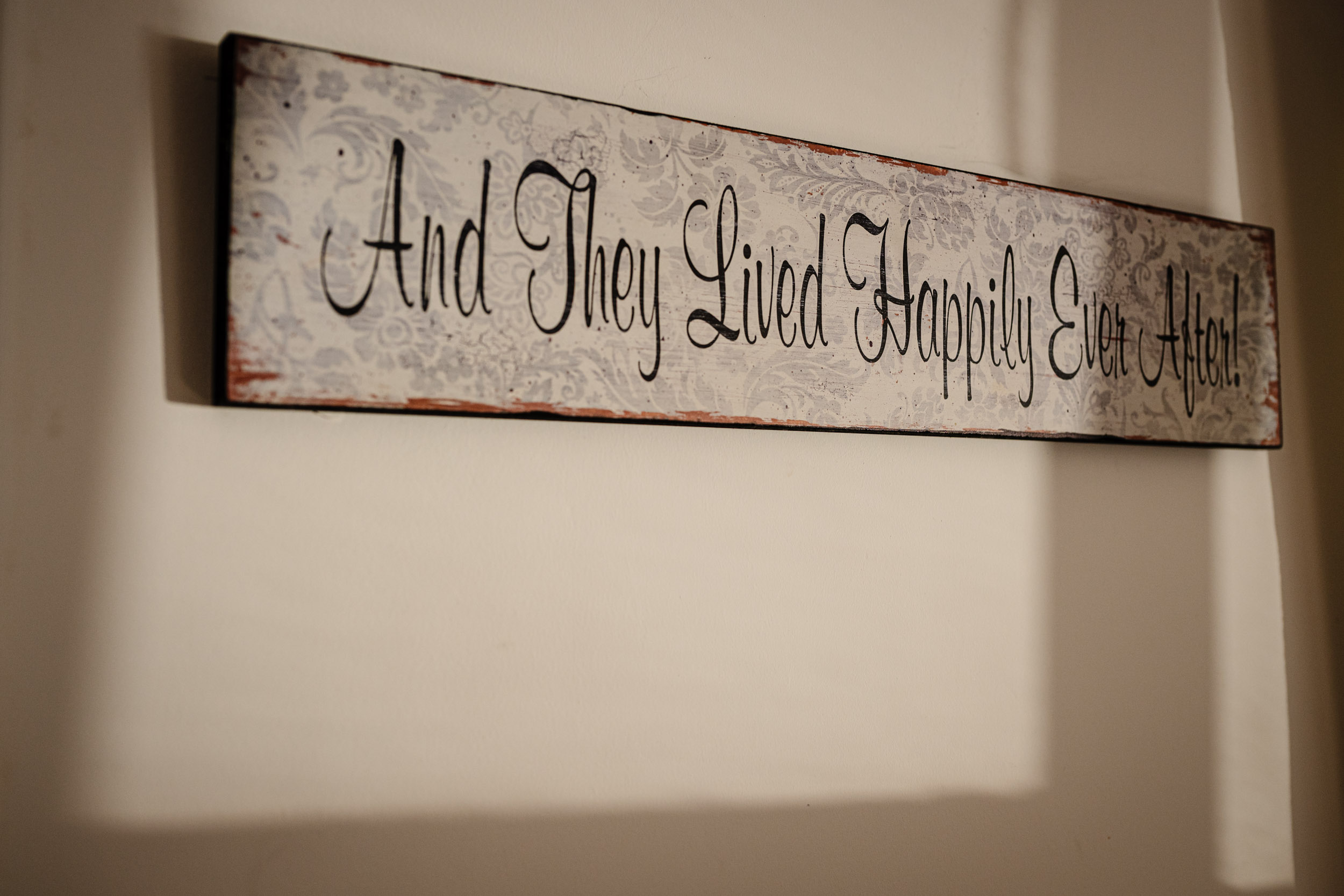 and they lived happily ever after sign