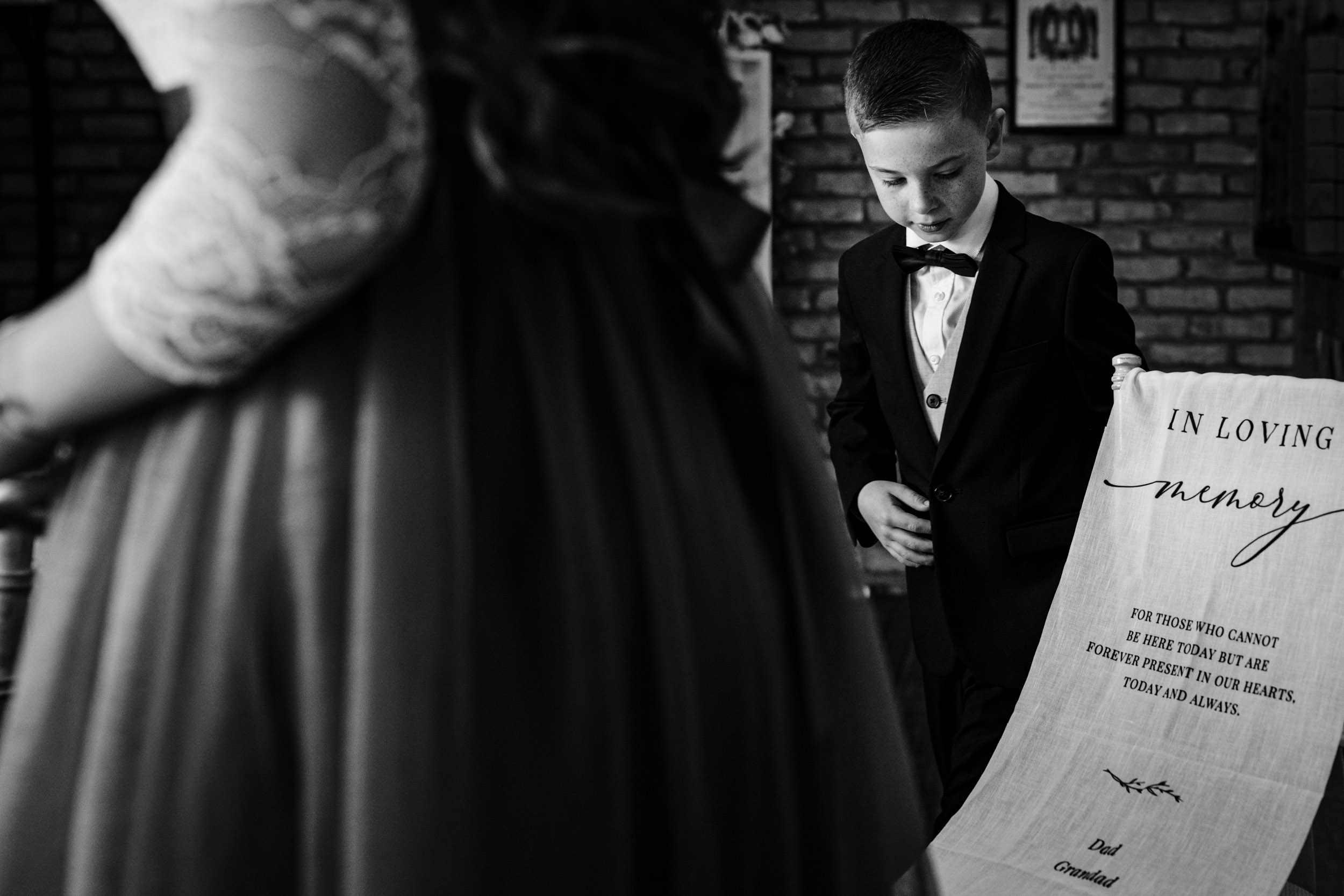 children setting up memorial chair