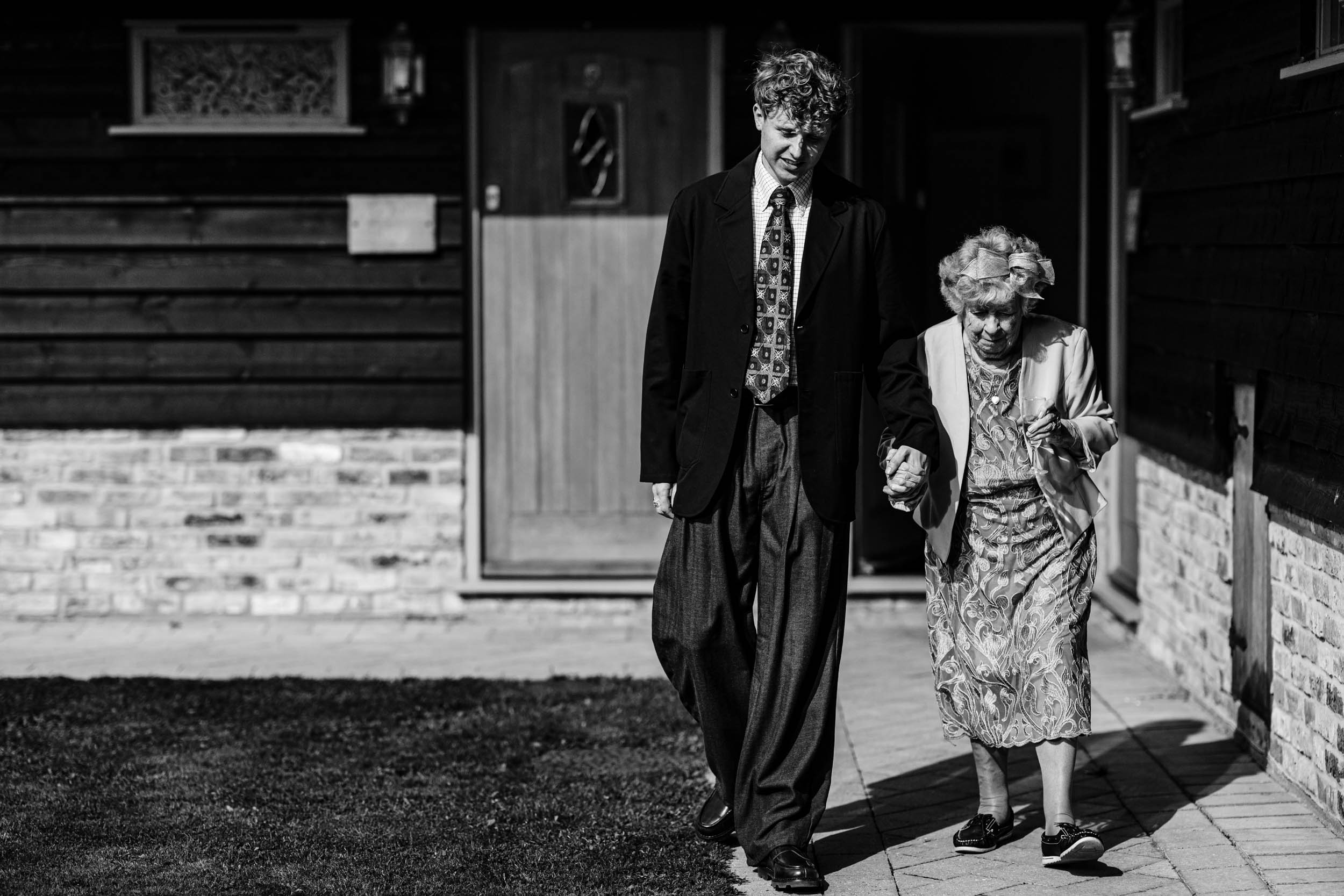 grandson and nan walking down