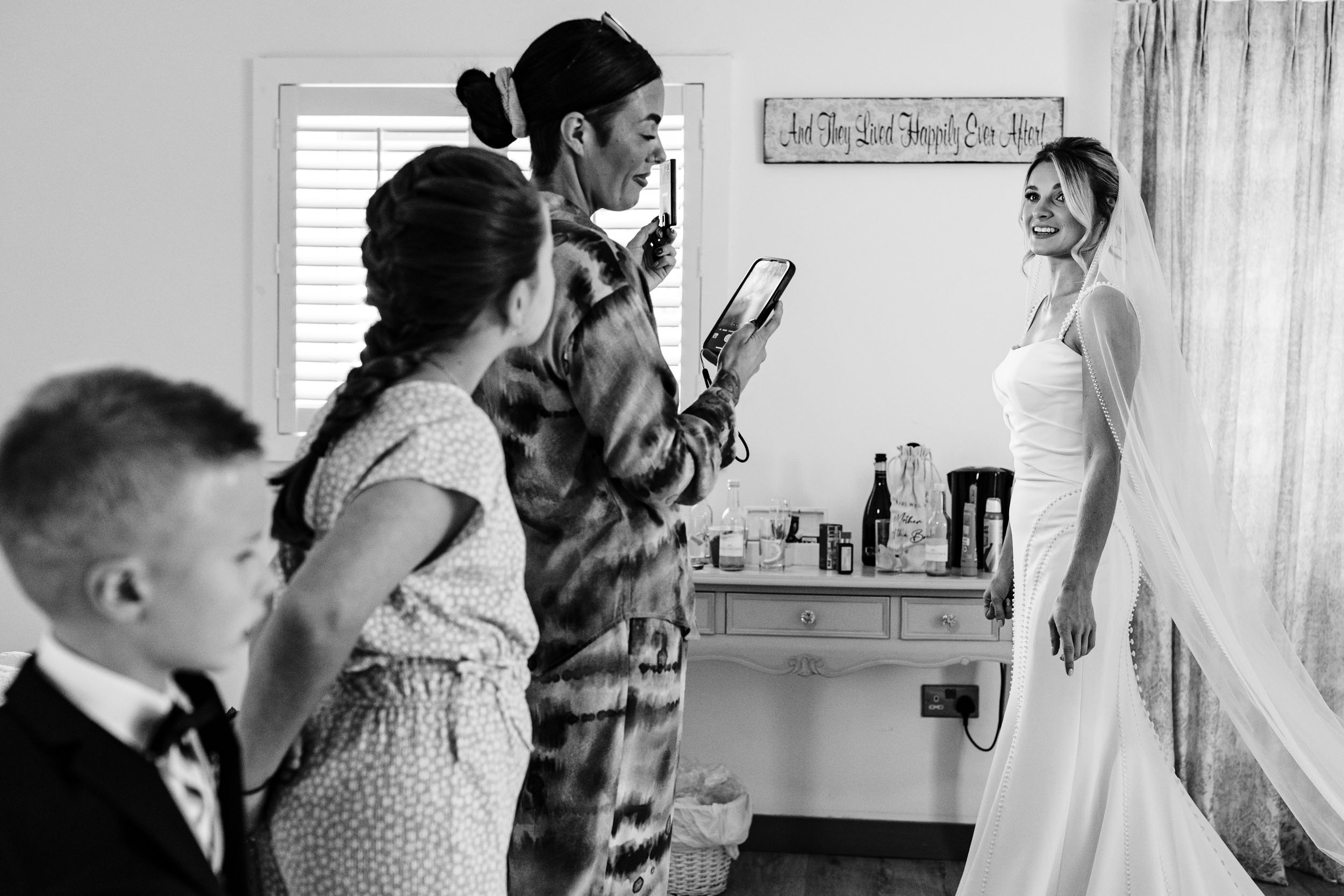 bride having a video done by the hair lady