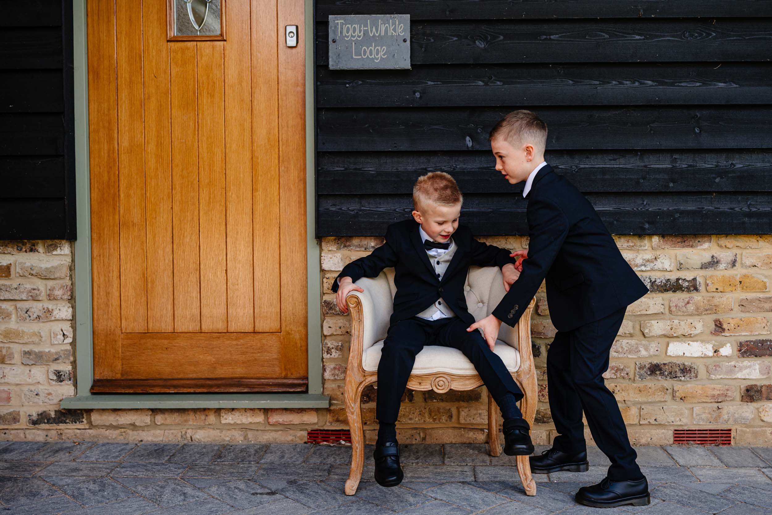 kids playing on chair outside