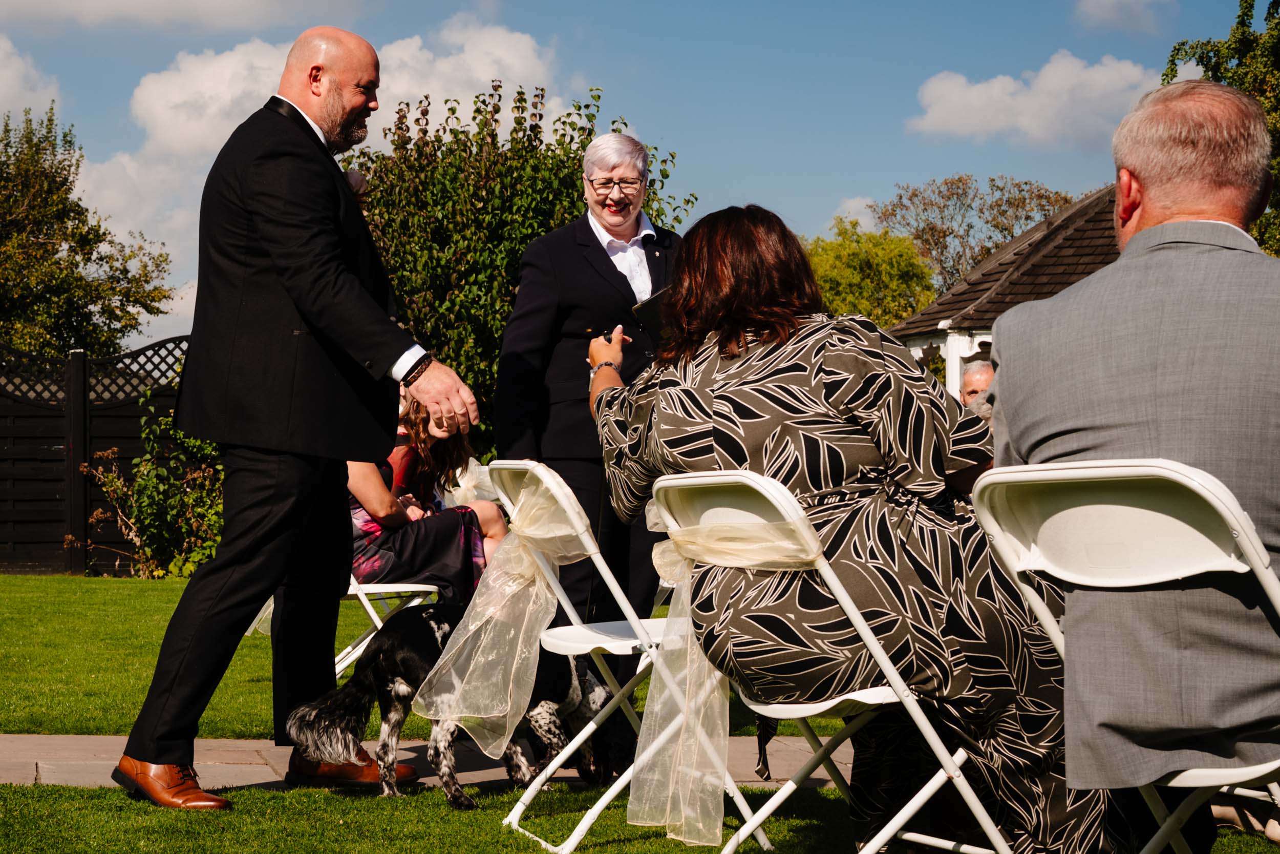 groom before ceremony with guests