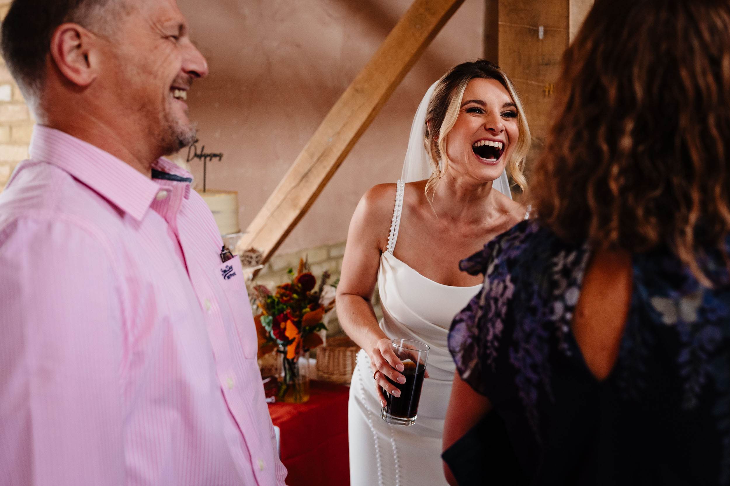 bride having a laugh with guests again she's so bubbly