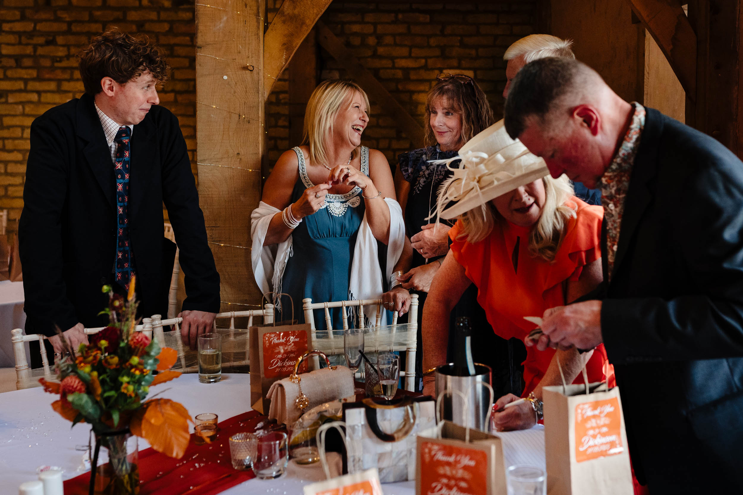 a busy frame of guests laughing