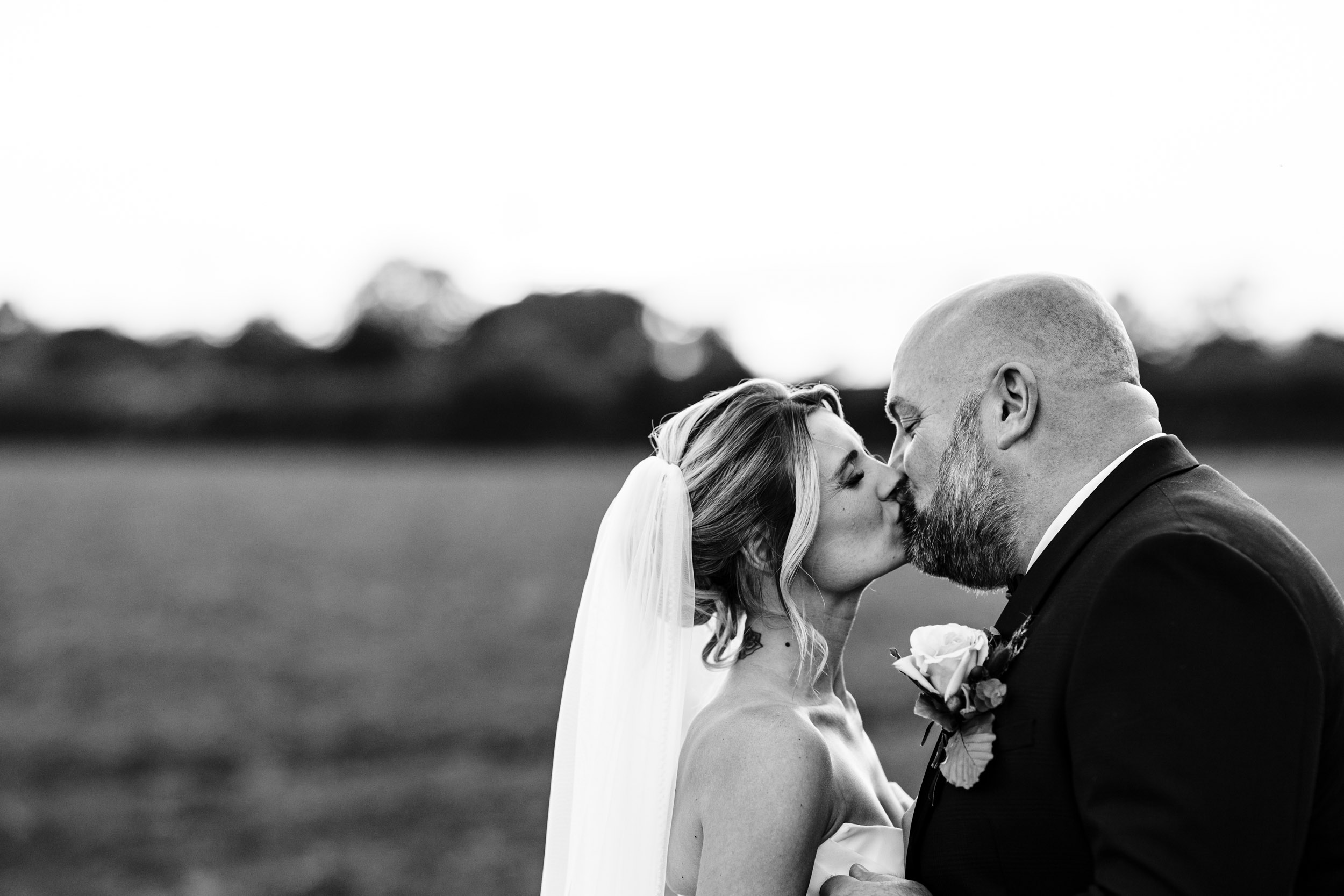 bride and groom kissing