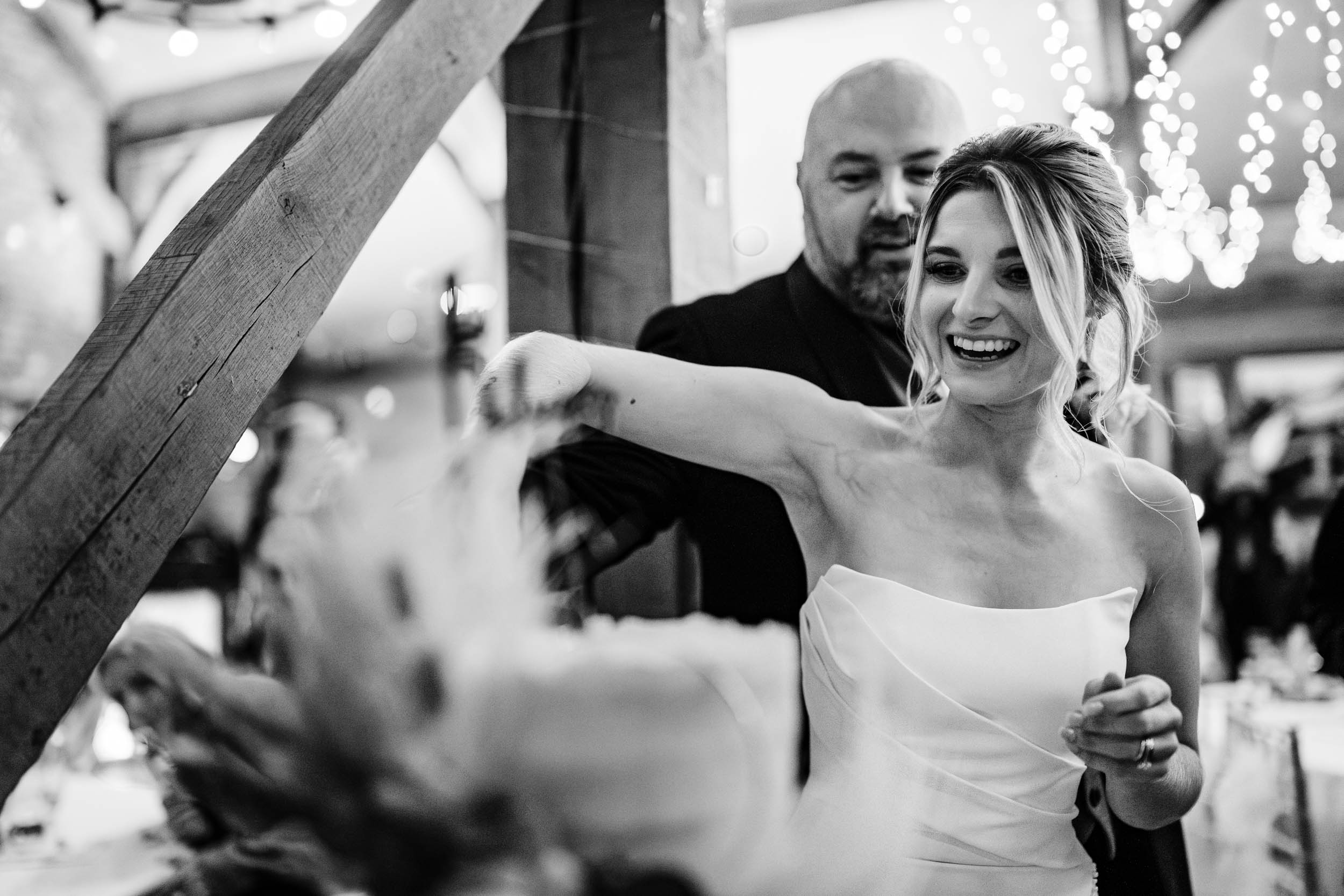 bride and groom cake cutting