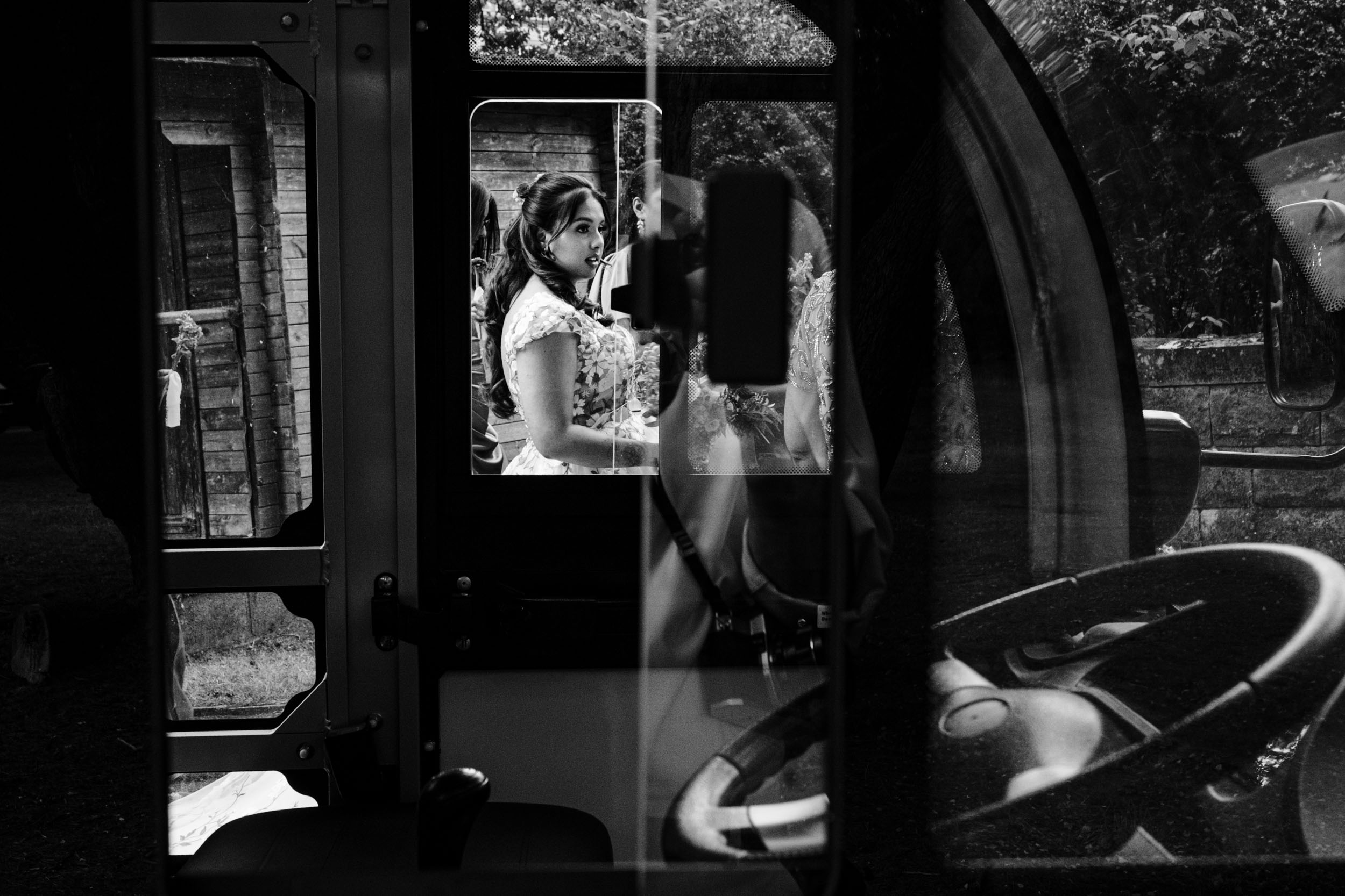 Candid photo of Anika through the bus window just before the ceremony