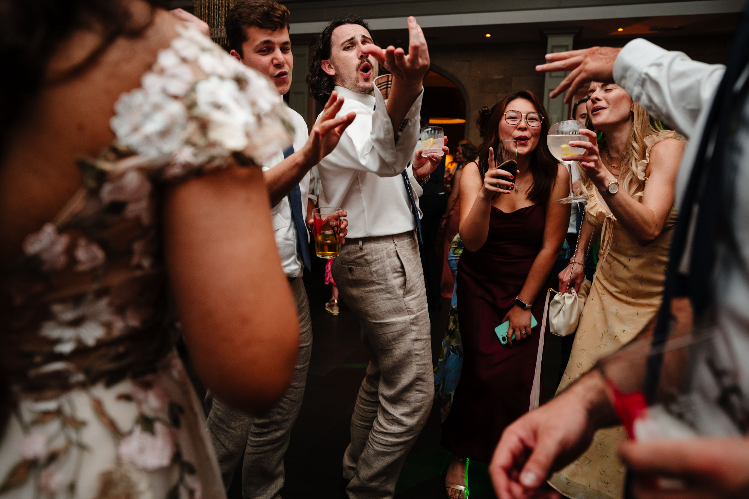 Wild dancefloor photo with guests letting loose