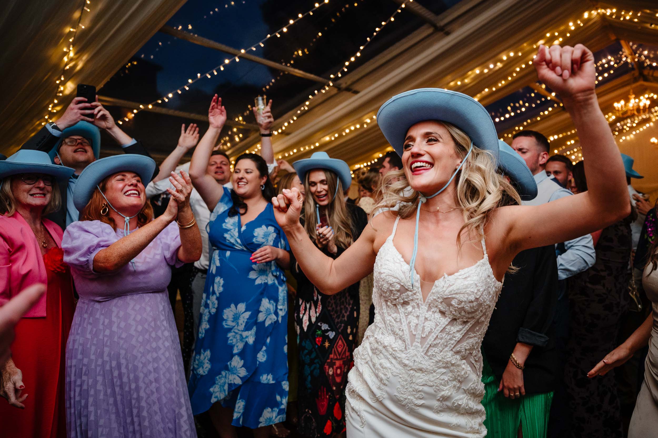 Bride having great fun dancing on the dance floor