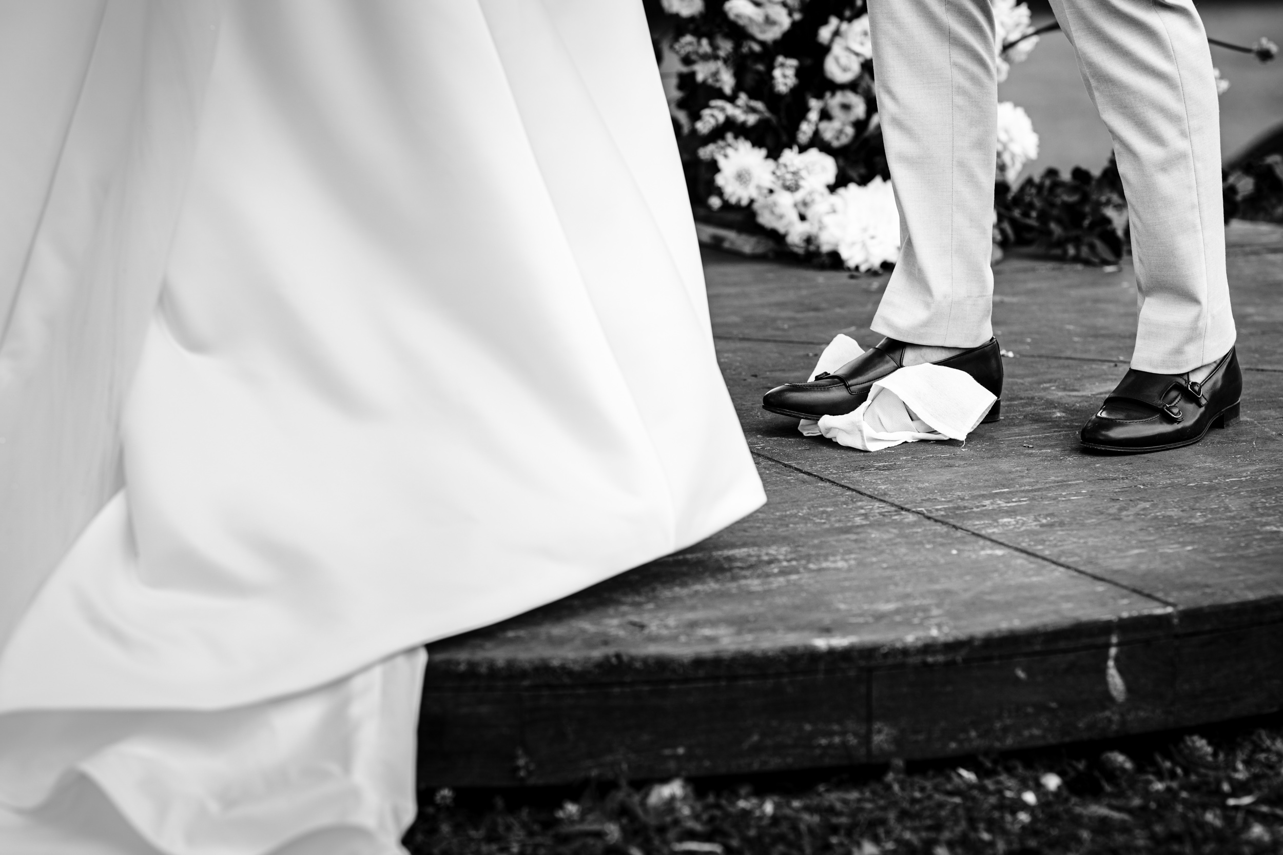 Groom breaking the glass jar during a traditional Israeli wedding ceremony