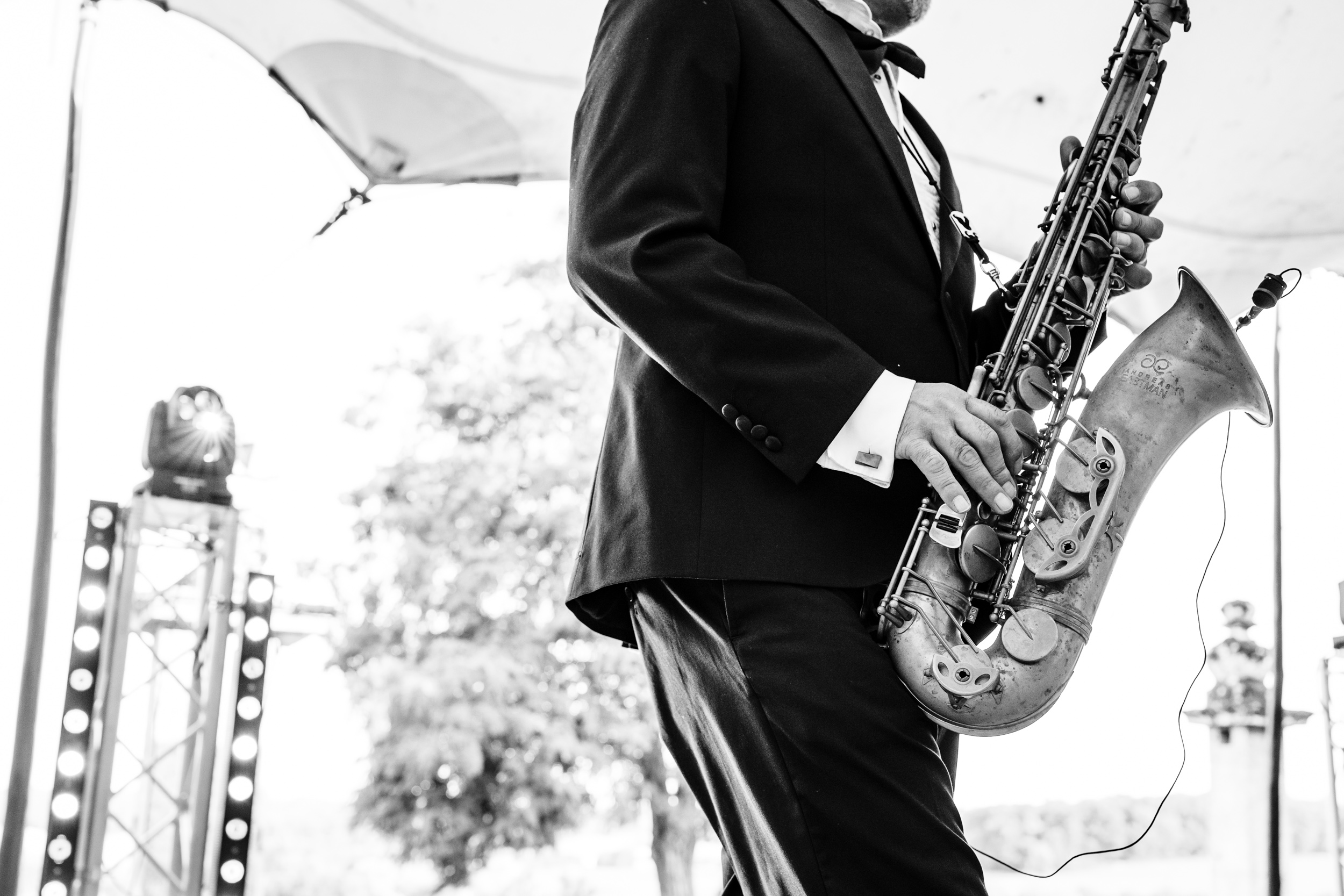 Close-up of the saxophone player performing during the celebrations