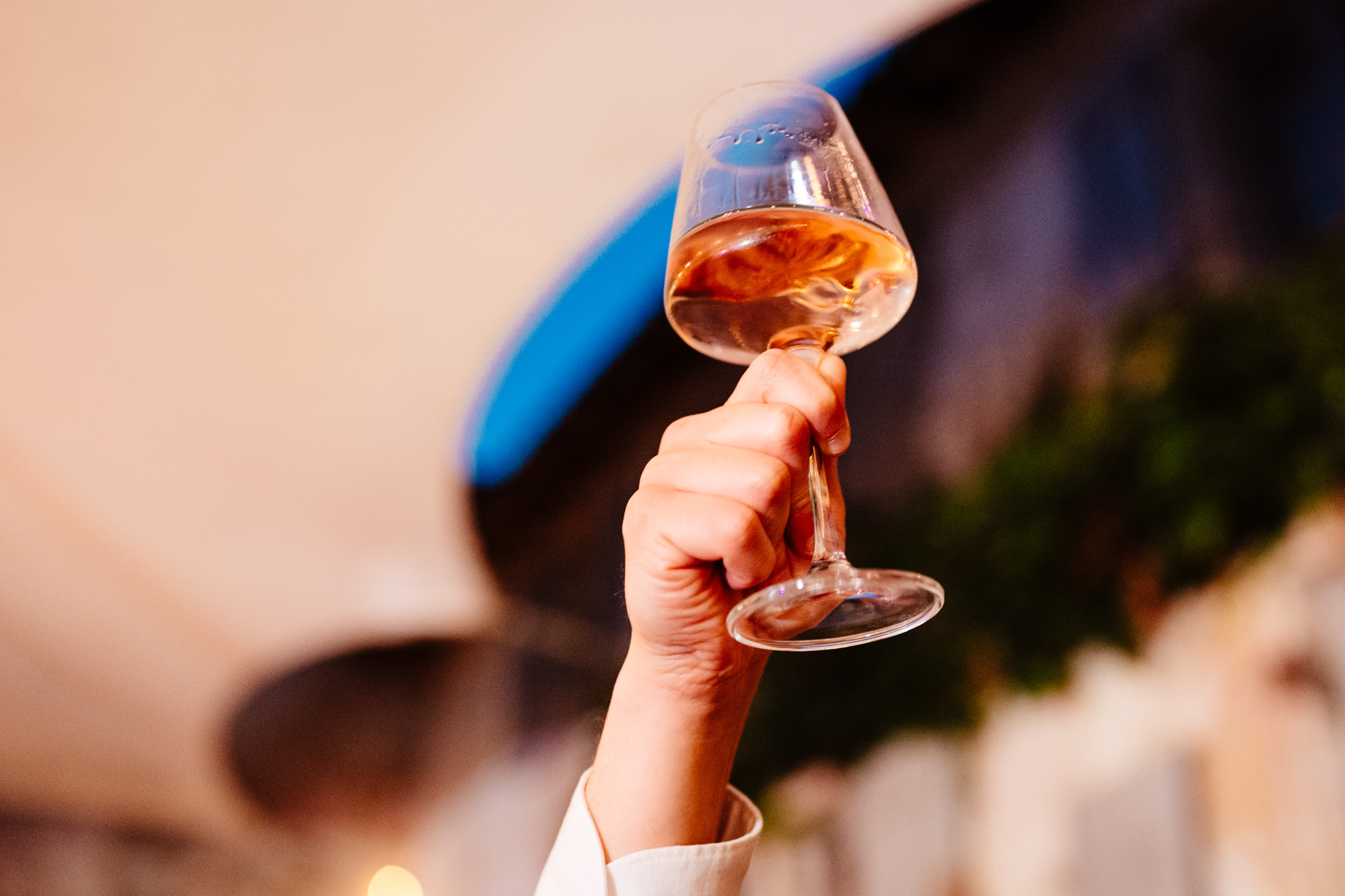 Raised glass during a wedding toast