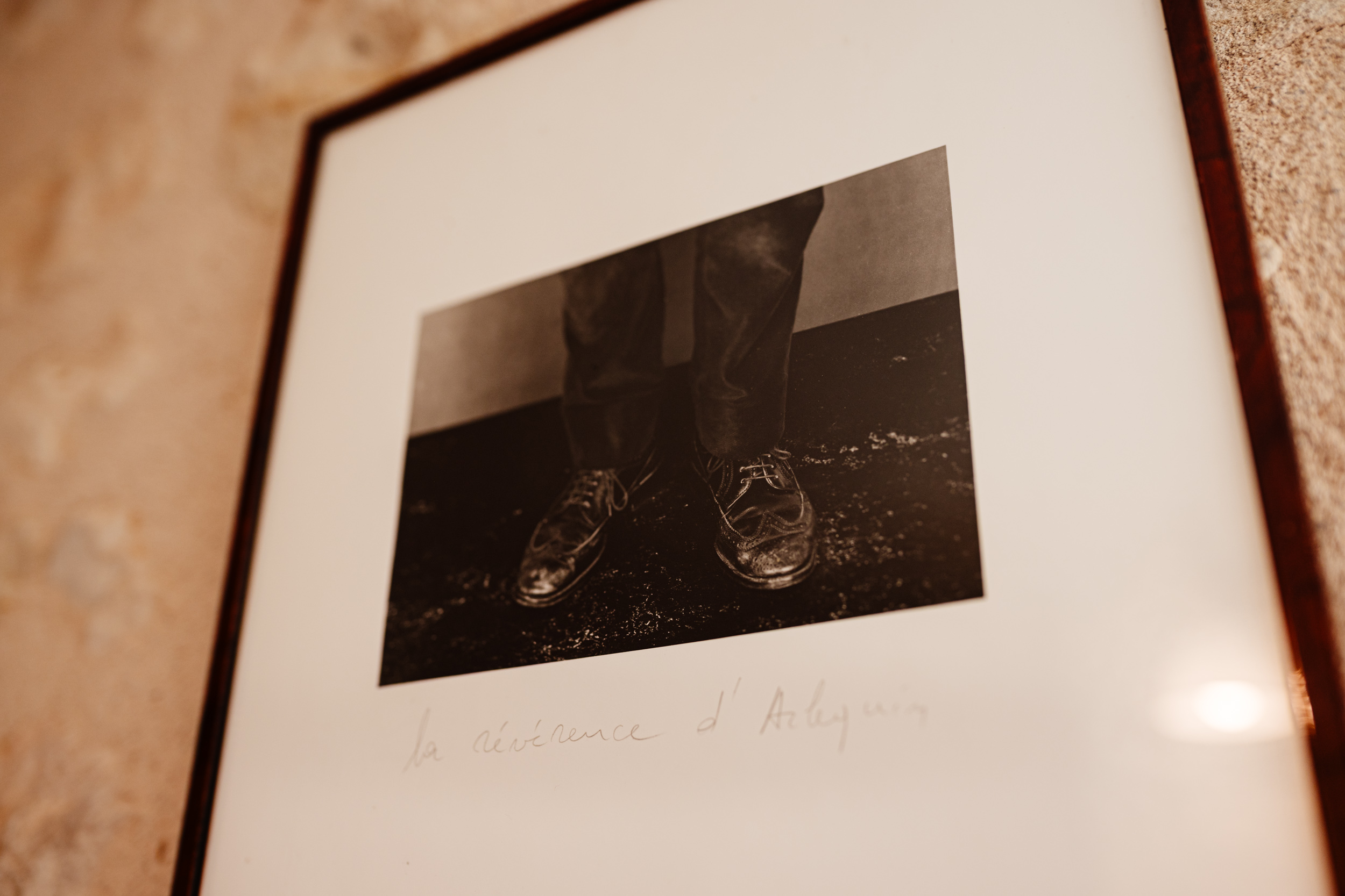 Groom’s shoes photographed at Chateau de Lerse as a transition into groom preparations