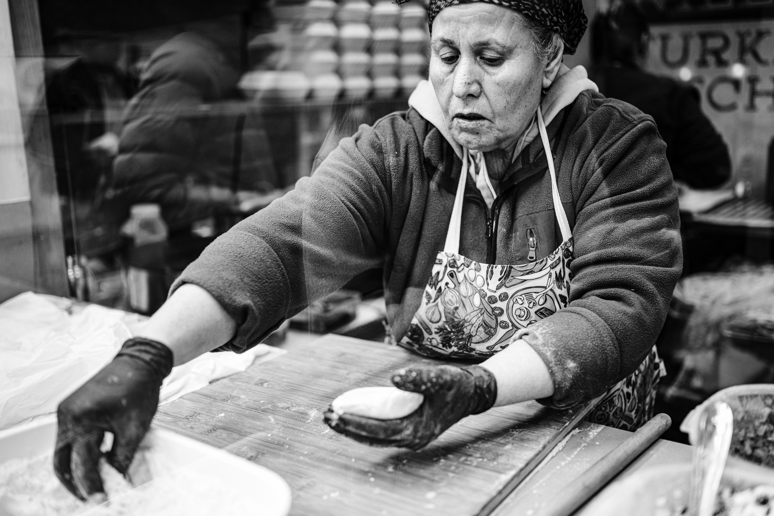 Woman preparing authentic Turkish street food.