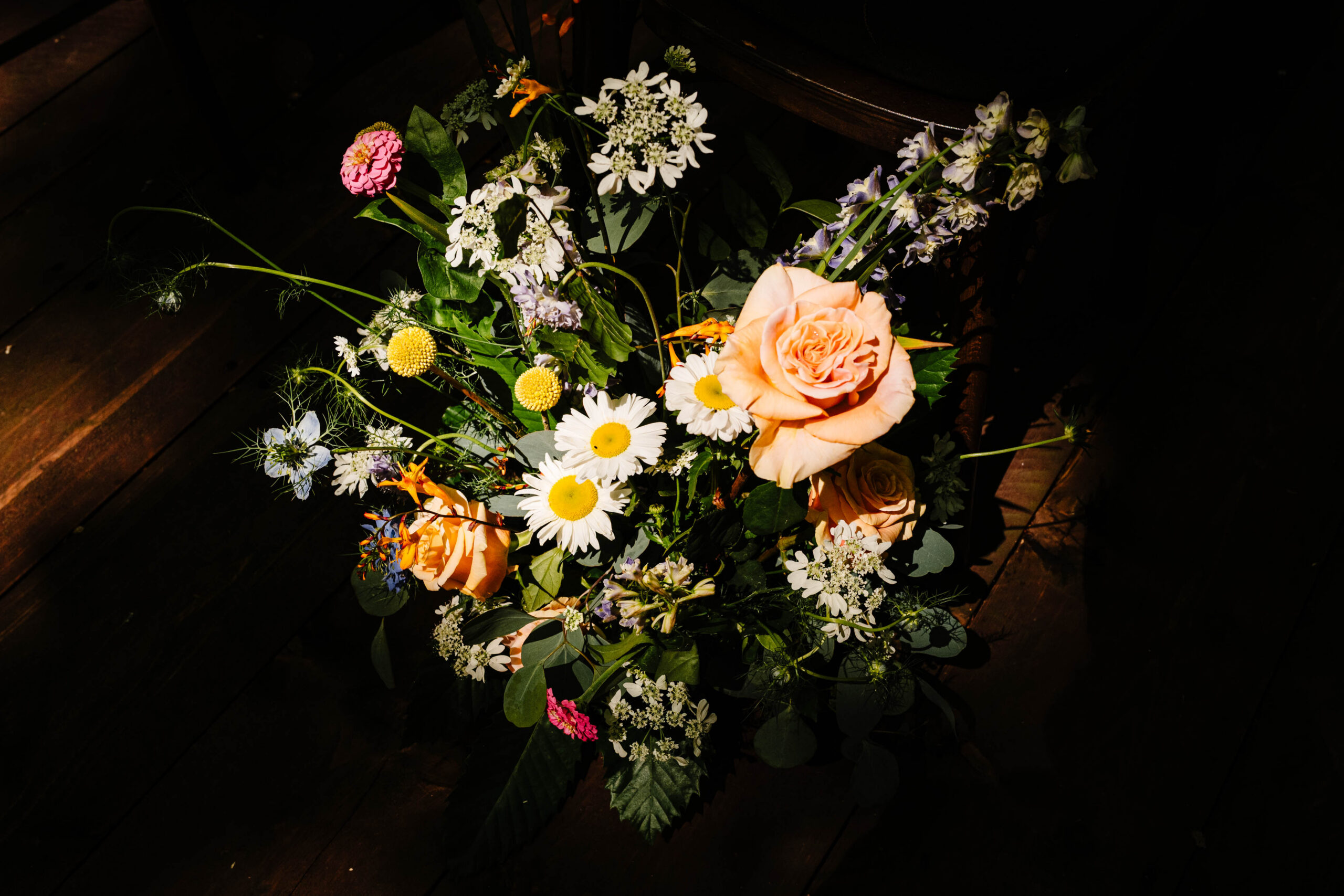 Wedding bouquet featuring seasonal flowers photographed at The Dreys wedding venue.