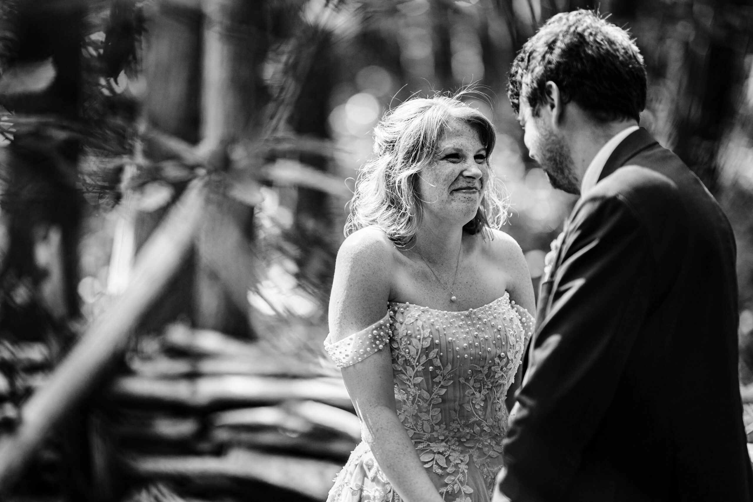 Bride and groom sharing a relaxed portrait session in the woods at The Dreys.