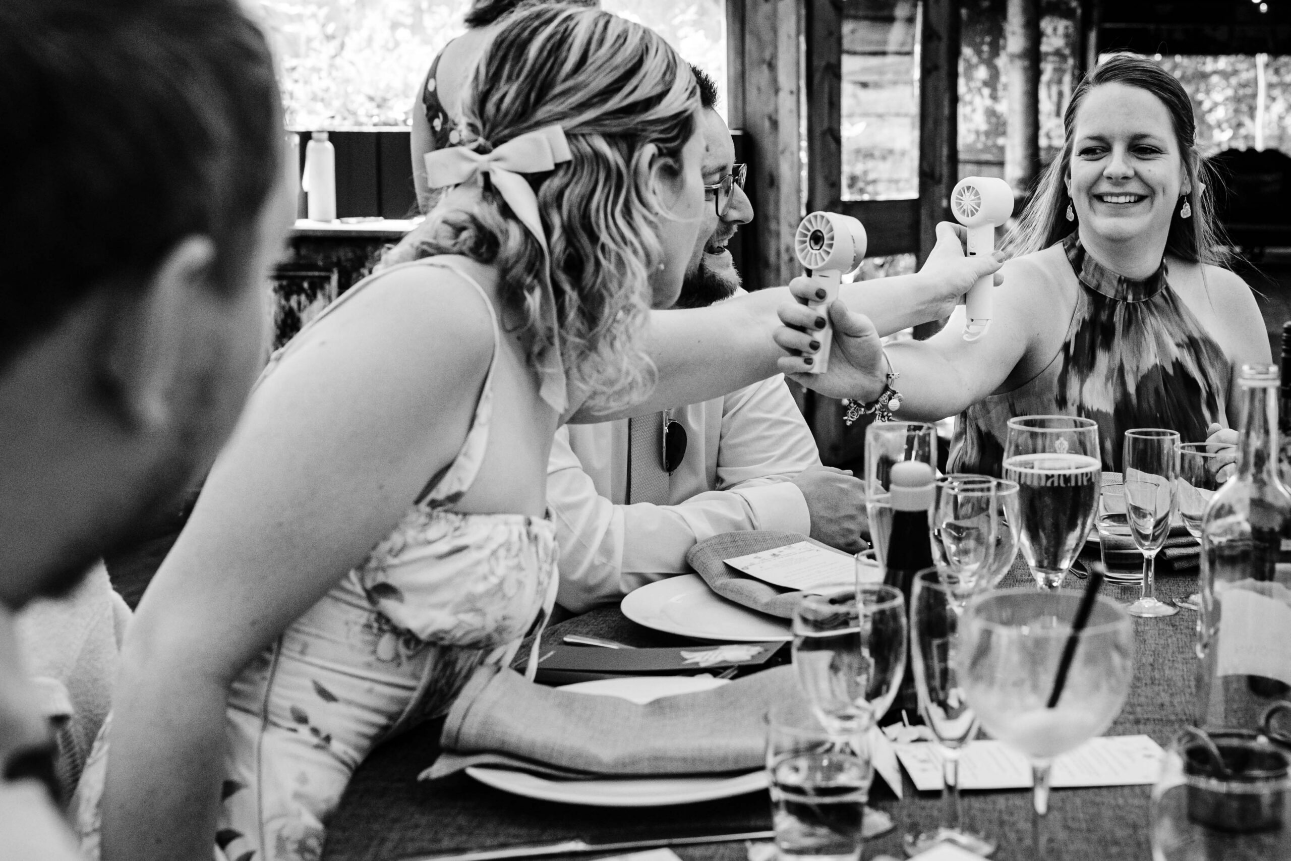 Guests enjoying dinner and conversation during a wedding reception at The Dreys.