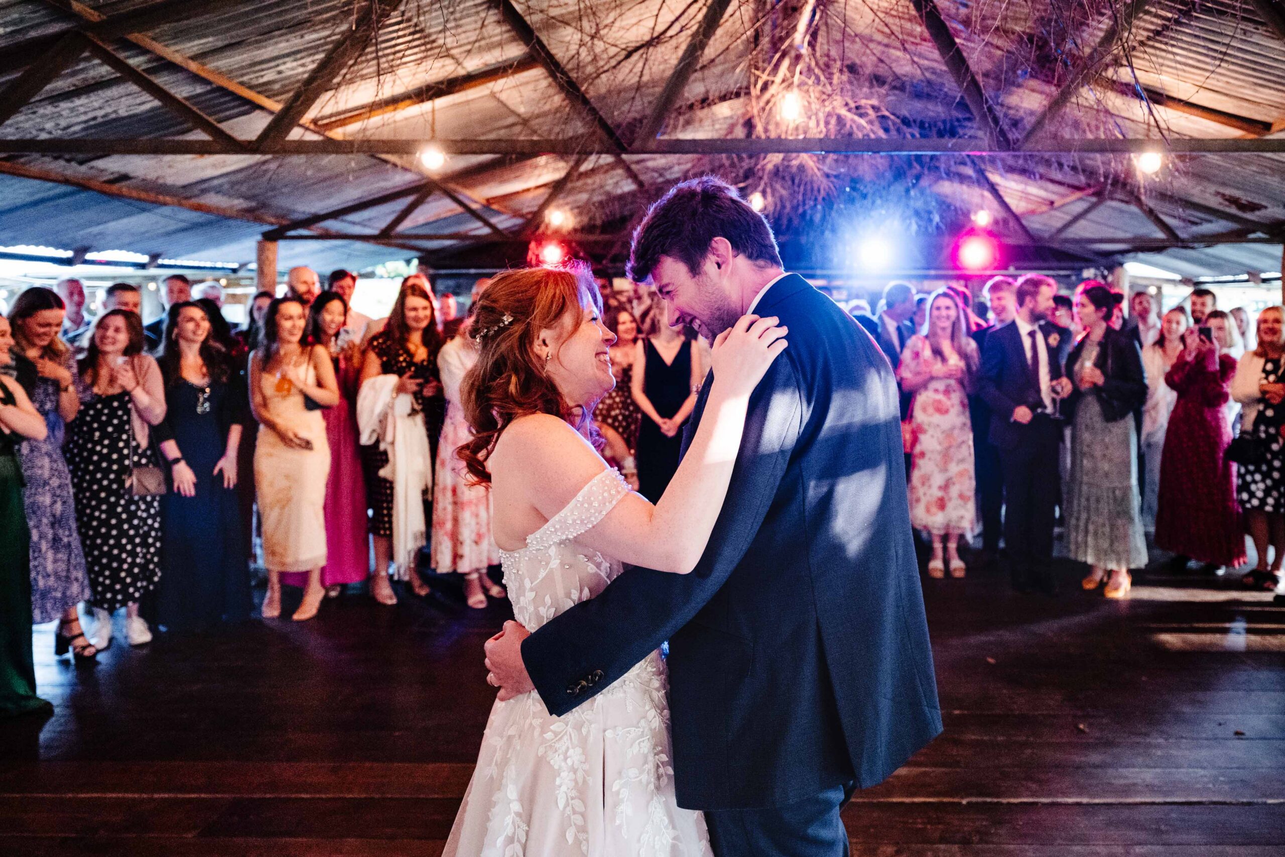 Bride and groom dancing during their first dance at The Dreys wedding venue.