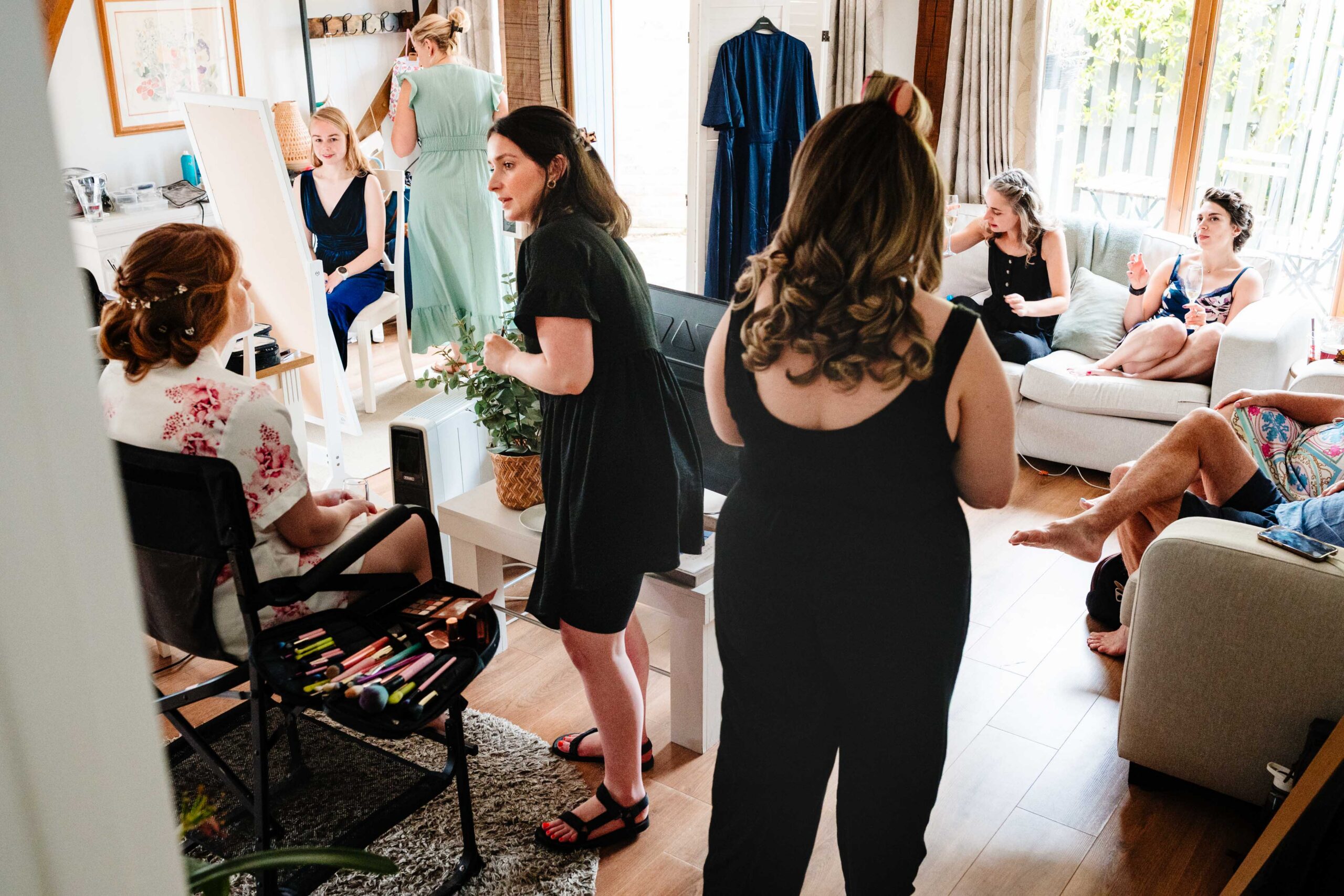 Bridal preparations with family and friends before a wedding ceremony at The Dreys.