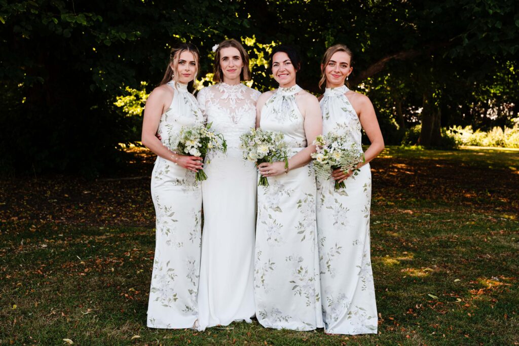 Bridesmaids group photo at a wedding.