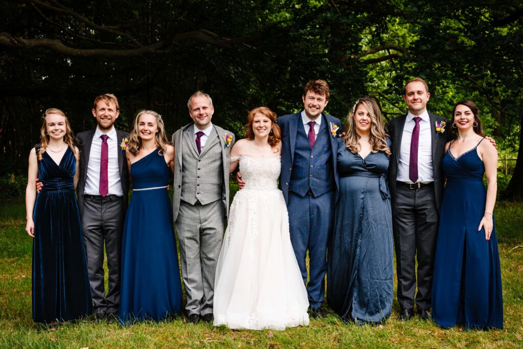 Family group photo at a wedding.